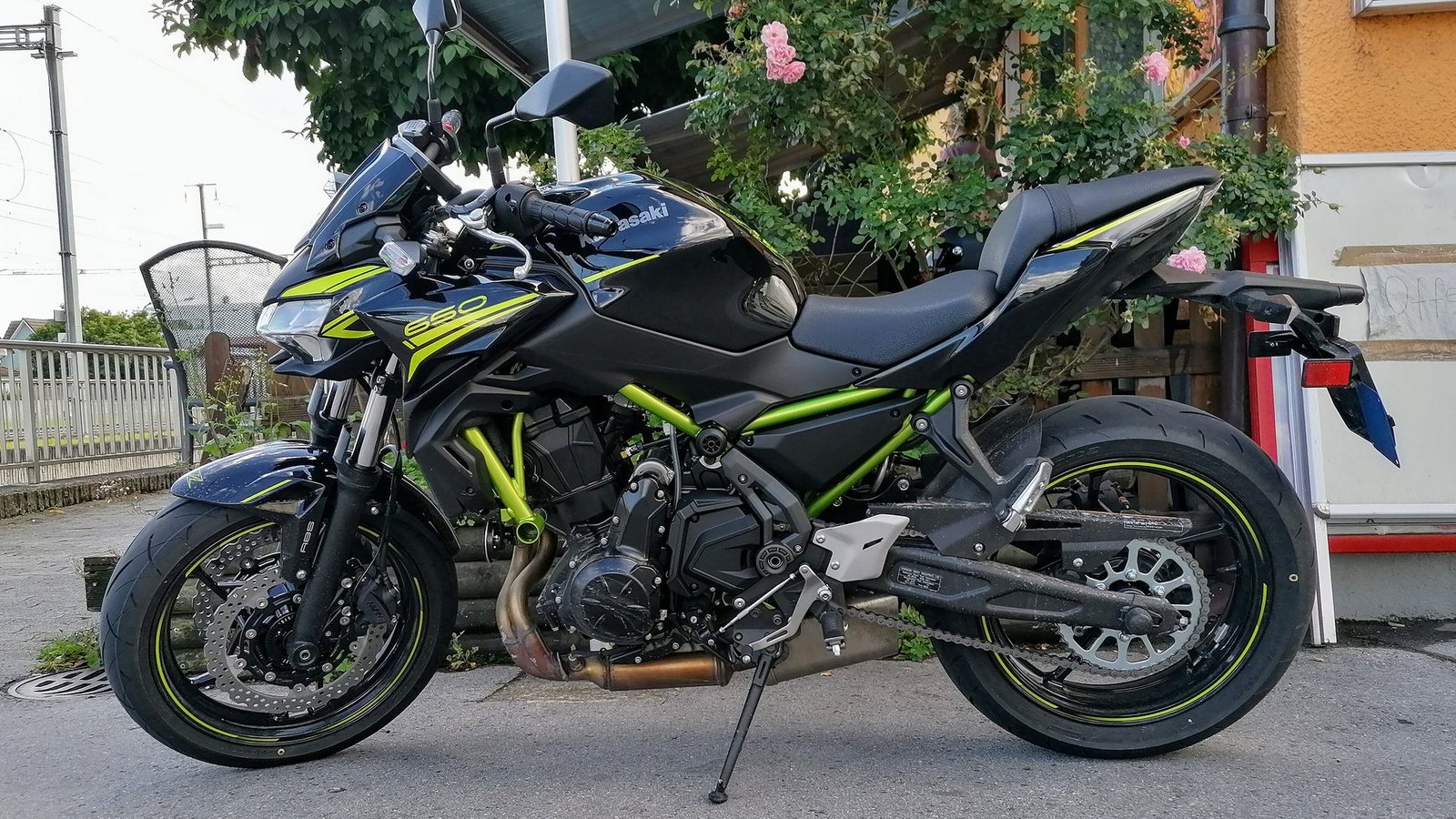 Black 2020 Kawasaki Z650 parked at the Heerbrugg train station