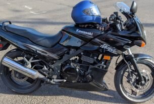 Black 2009 Kawasaki Ninja EX-500 kawasaki ninja 500 motorcycle shown from the side