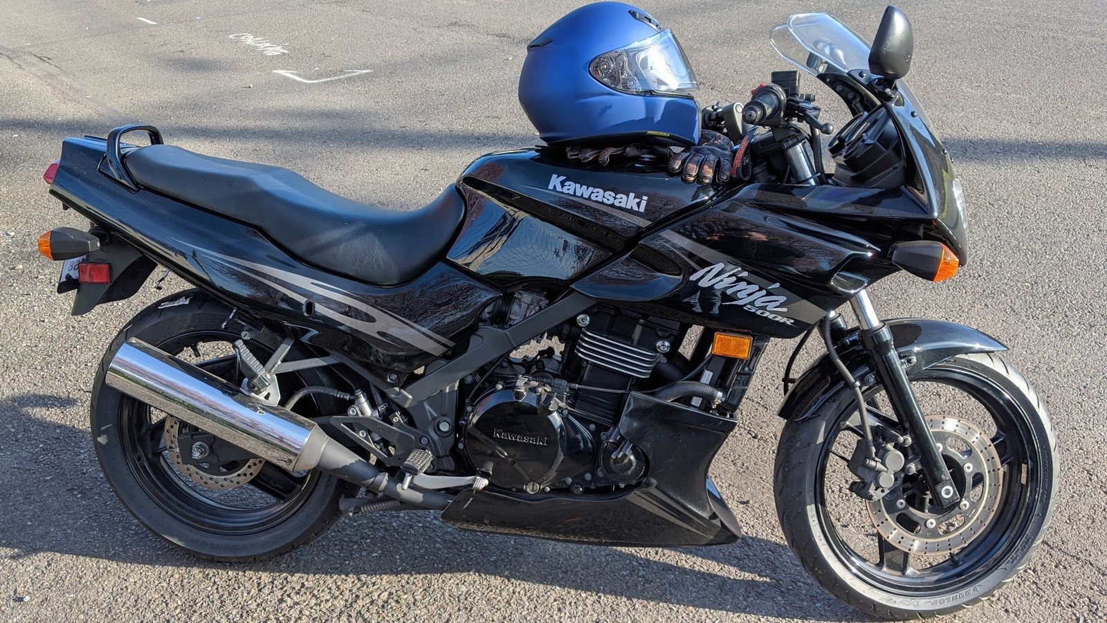 Black 2009 Kawasaki Ninja EX-500 kawasaki ninja 500 motorcycle shown from the side